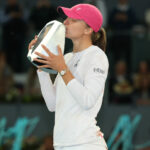 Iga Swiatek with the 2024 Madrid Open trophy